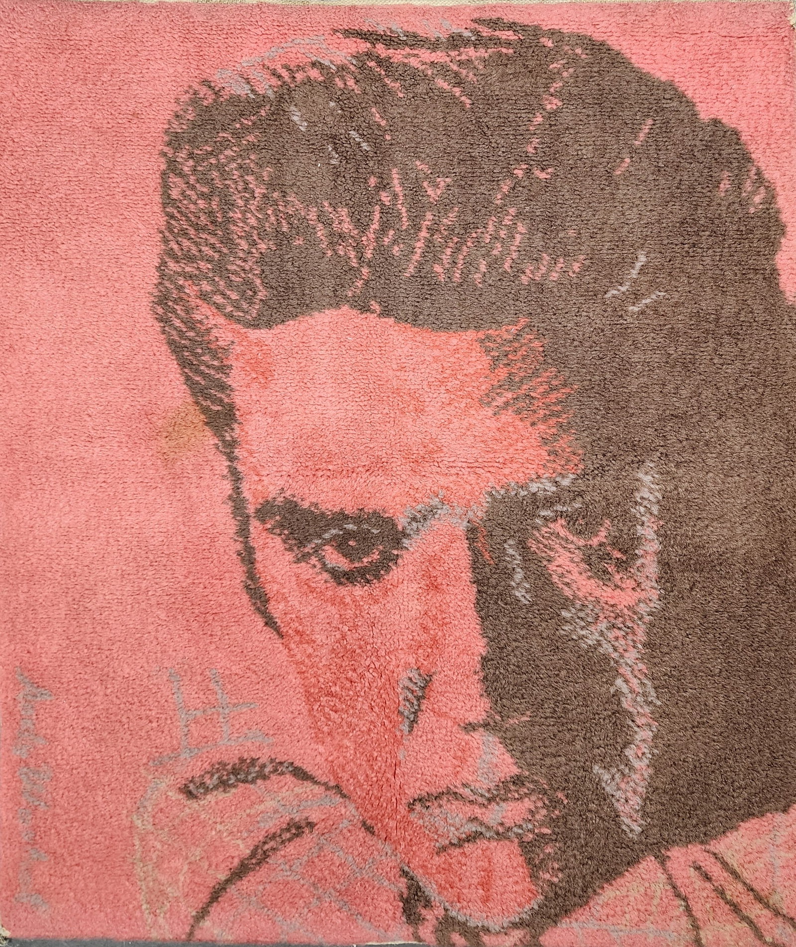 A 20th Century Axminster Woven Art Rug, Red Elvis 1962 by Museum Masters with the authorization of: A 20th Century Axminster Woven Art Rug, Red Elvis 1962 by Museum Masters with the authorization of the Andy Warhol Foudation, Signed Andy Warhol, from an edition of 5000, 34" x 29 1/4"
