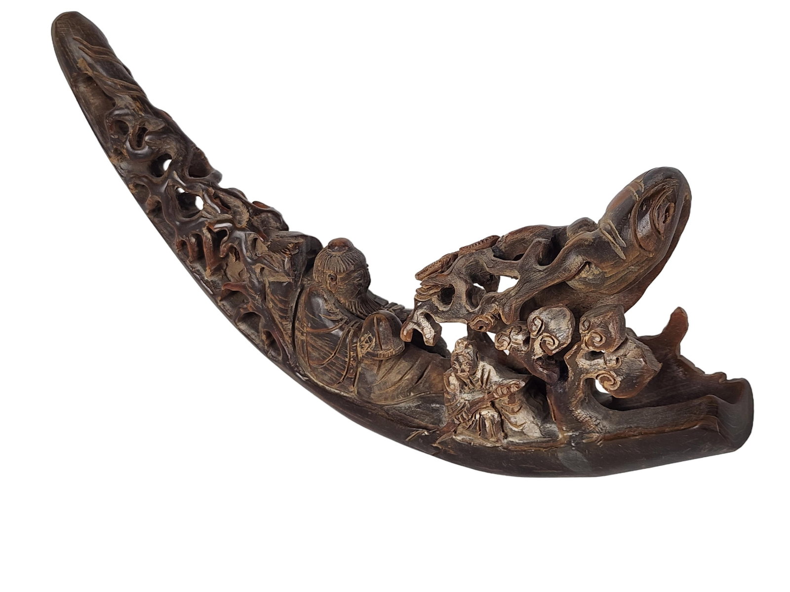 Chinese Horn Carved Figural Group, 20th Century, with an seated Immortal and two boat men having: Chinese Horn Carved Figural Group, 20th Century, with an seated Immortal and two boat men having branches and lingzhi sprays, 12 3/4" L.