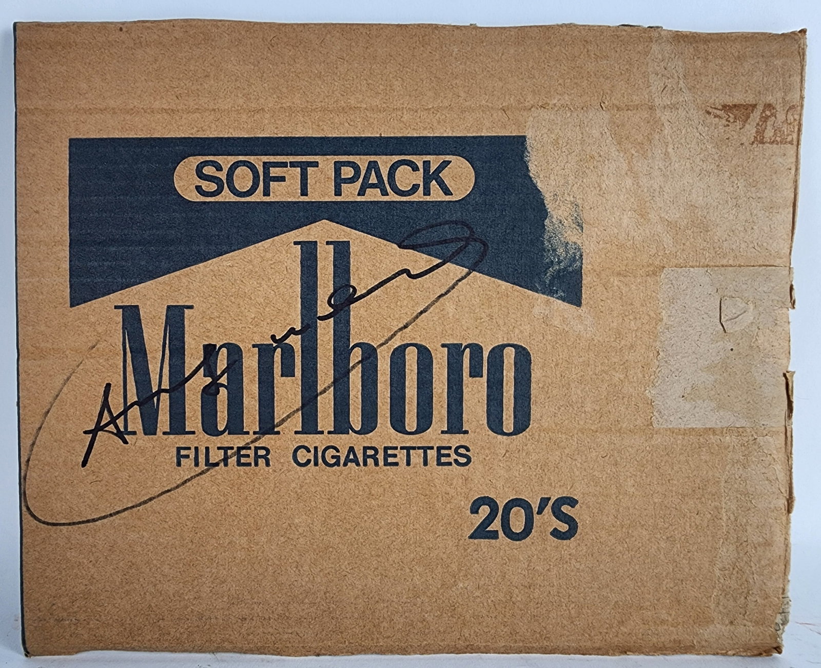 Andy Warhol (American, 1942-1988) After, Fragment of Marlboro Box, Signed in black marker, and: Andy Warhol (American, 1942-1988) After, Fragment of Marlboro Box, Signed in black marker, and bearing the artist's stamp on back, 9 1/2" x 11 1/4", loose and unframed.