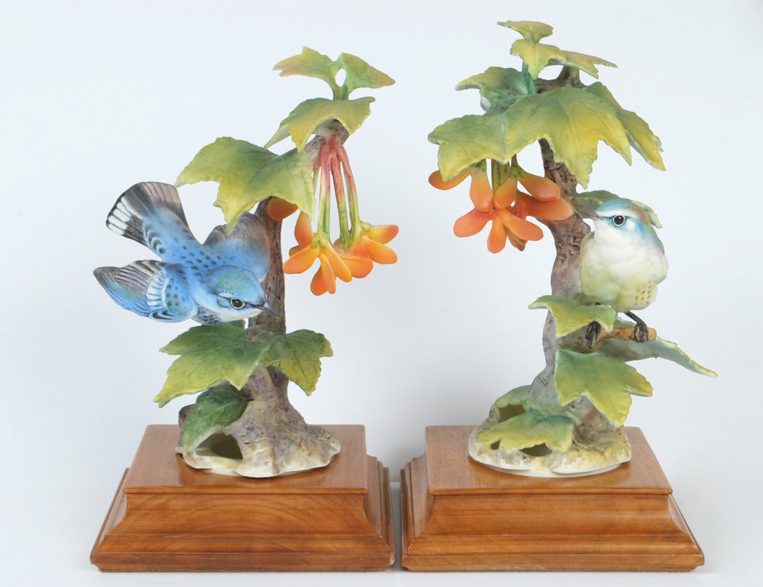 PAIR OF D. DOUGHTY PORCELAIN "CERULEAN WARBLER": English. 1965. By Royal Worcester. Limited Edition of 500. With wood stands. Heights 8 1/4" and 8 3/4". (400/500)