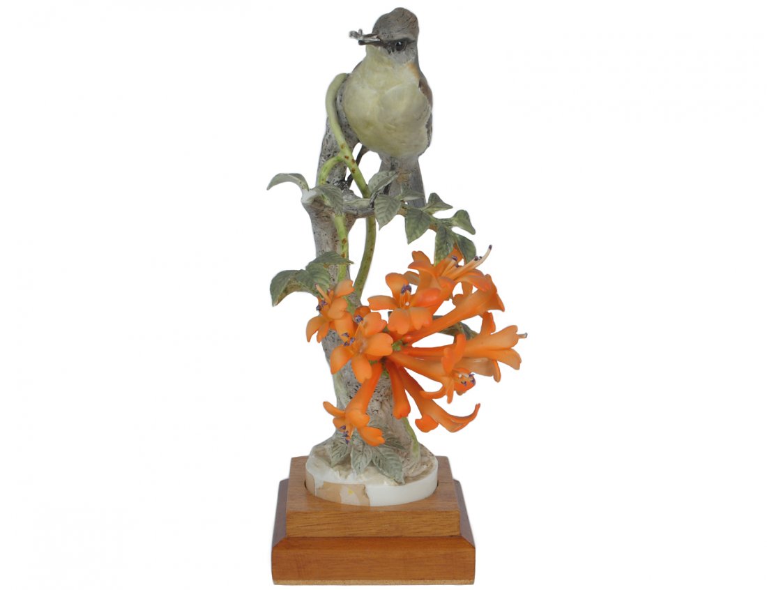 D. DOUGHTY PORCELAIN "PHOEBE AND FLAME VINE": English. 1956. By Royal Worcester. Limited Edition of 500. With wood base. Height 8 1/8". (Cond: loss of leaf) (150/250)