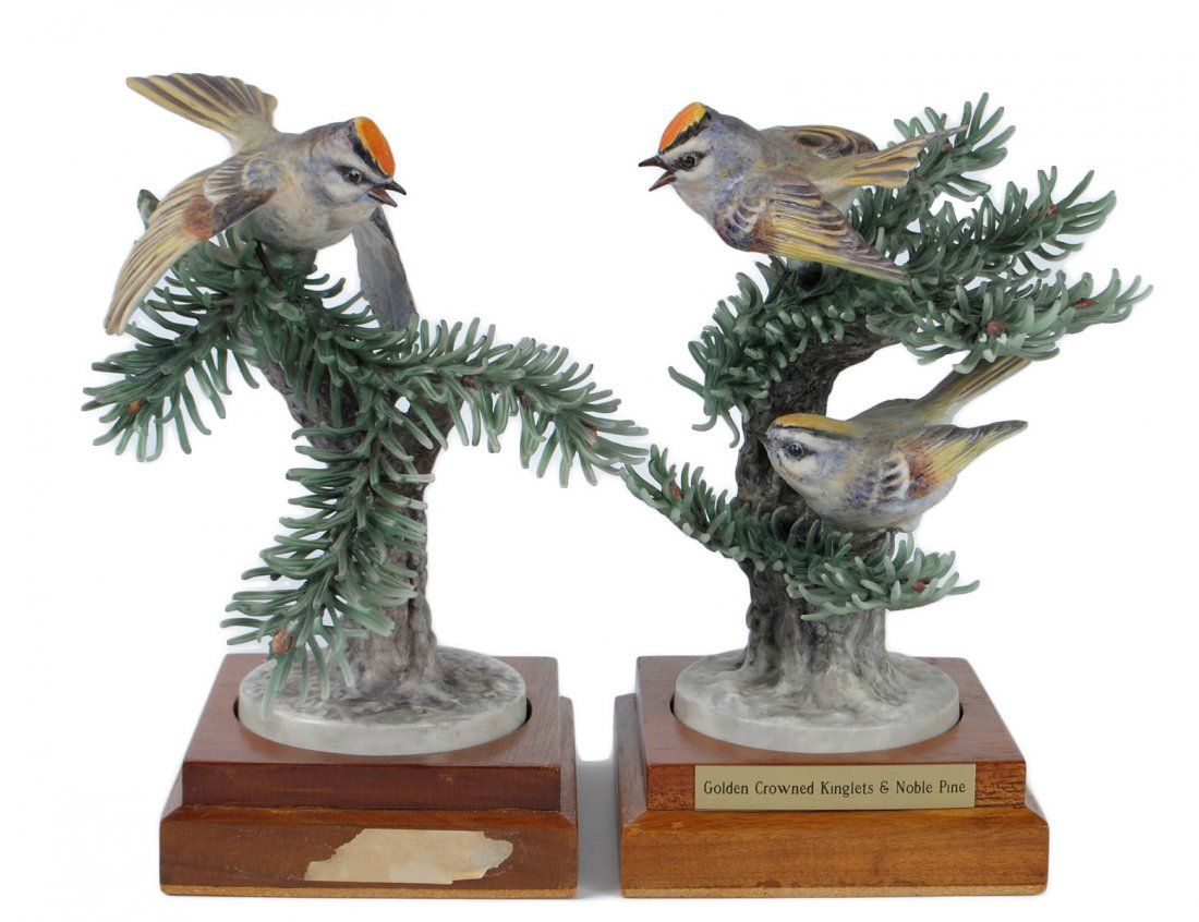 PAIR OF D. DOUGHTY PORCELAIN "KINGLET COCK & KINGLET DO: English. 1951. By Royal Worcester. Limited Edition of 500. Height 7 1/4". With wood stands. (Cond: minor loss to thistle) (400/600)