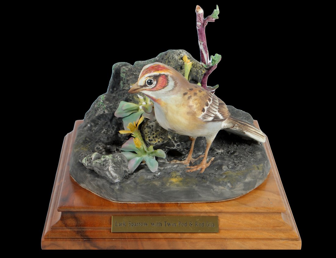 D. DOUGHTY PORCELAIN "LARK SPARROW WITH TWIN POD & RED : English. 1960. By Royal Worcester. Limited Edition of 500. With wood stand. Width 5 7/8". (Cond: losses) (200/300)