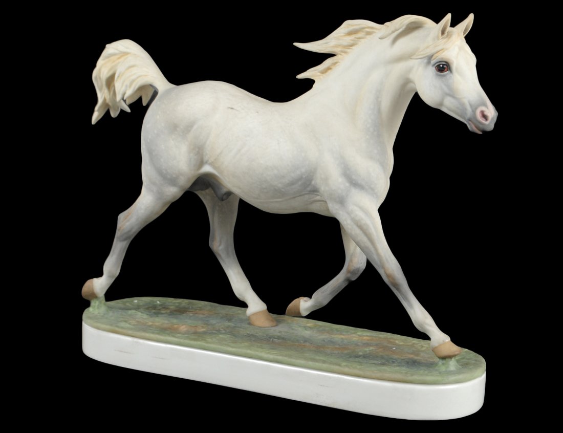 ROYAL WORCESTER PORCELAIN "ARAB STALLION": English. 1963. Designed by D. Lindner. Limited Edition of 500. Height 9". With wood base. (800/1200)