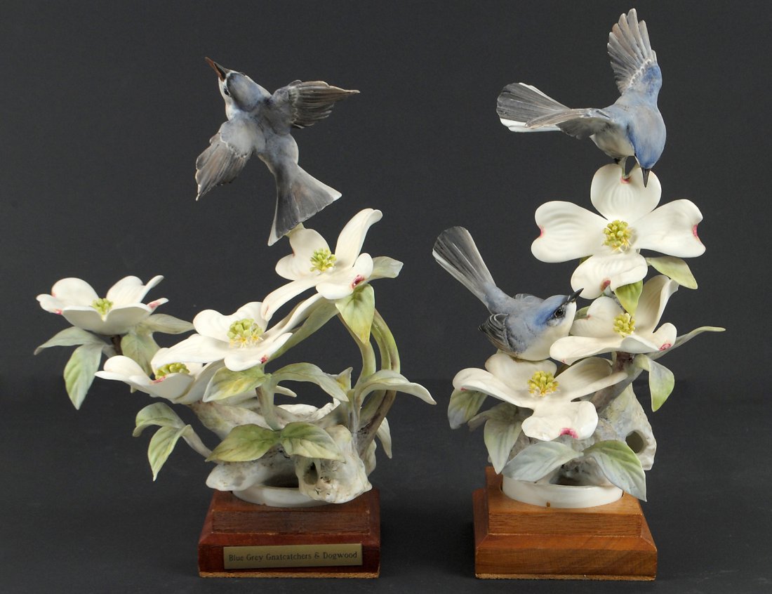 PAIR OF D. DOUGHTY PORCELAIN "BLUE GREY GNATCATCHERS SI: AND DOUBLE". English. 1954. By Royal Worcester. Limited Edition of 500. With wood bases. Height 10". (Cond: one restored) (300/400)