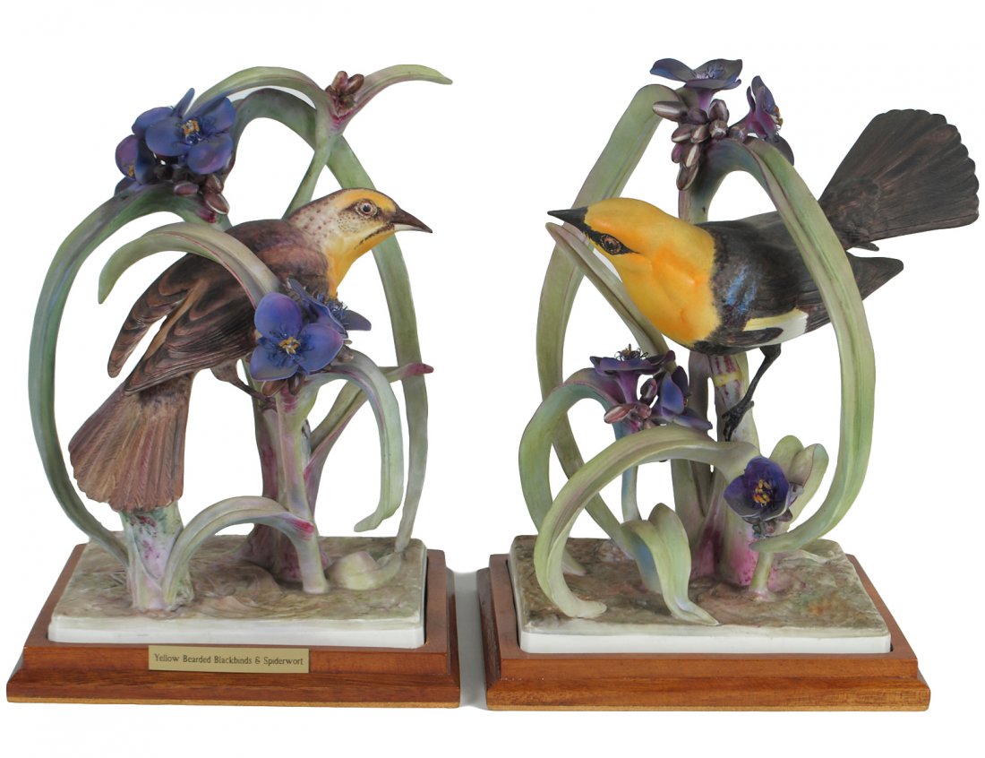 PAIR OF D. DOUGHTY PORCELAIN "YELLO HEADED BLACKBIRD CO: English. 1950. By Royal Worcester. Limited Edition of 350. Height 11 1/2". With wood bases. (600/800)