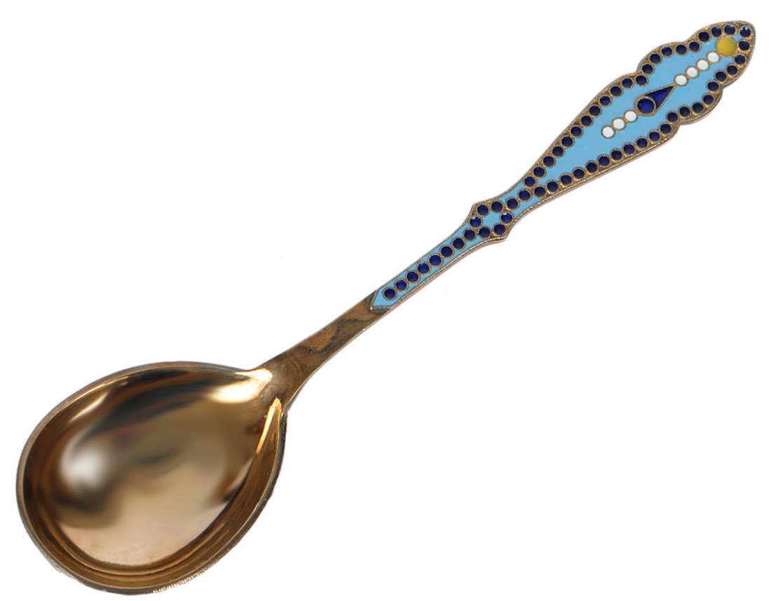 SOVIET UNION GILT STERLING SILVER AND ENAMEL SPOON: Stamped 925. With shades of blue enamel. Length 6 7/8". (200/300)