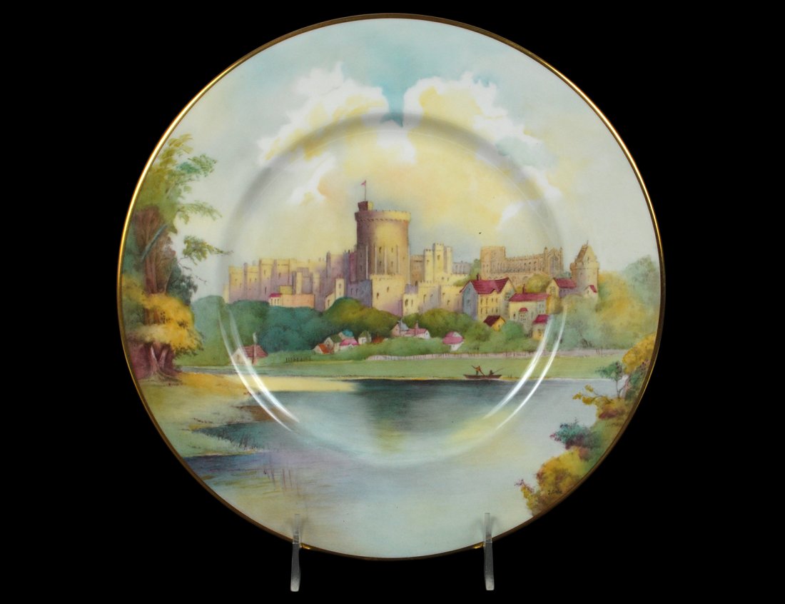 SET OF TWELVE MINTON PORCELAIN "CASTLE" PLATES: English. 20th Century. Each with factory mark and identification. Diameter 10 5/8". With original boxes. (600/800)