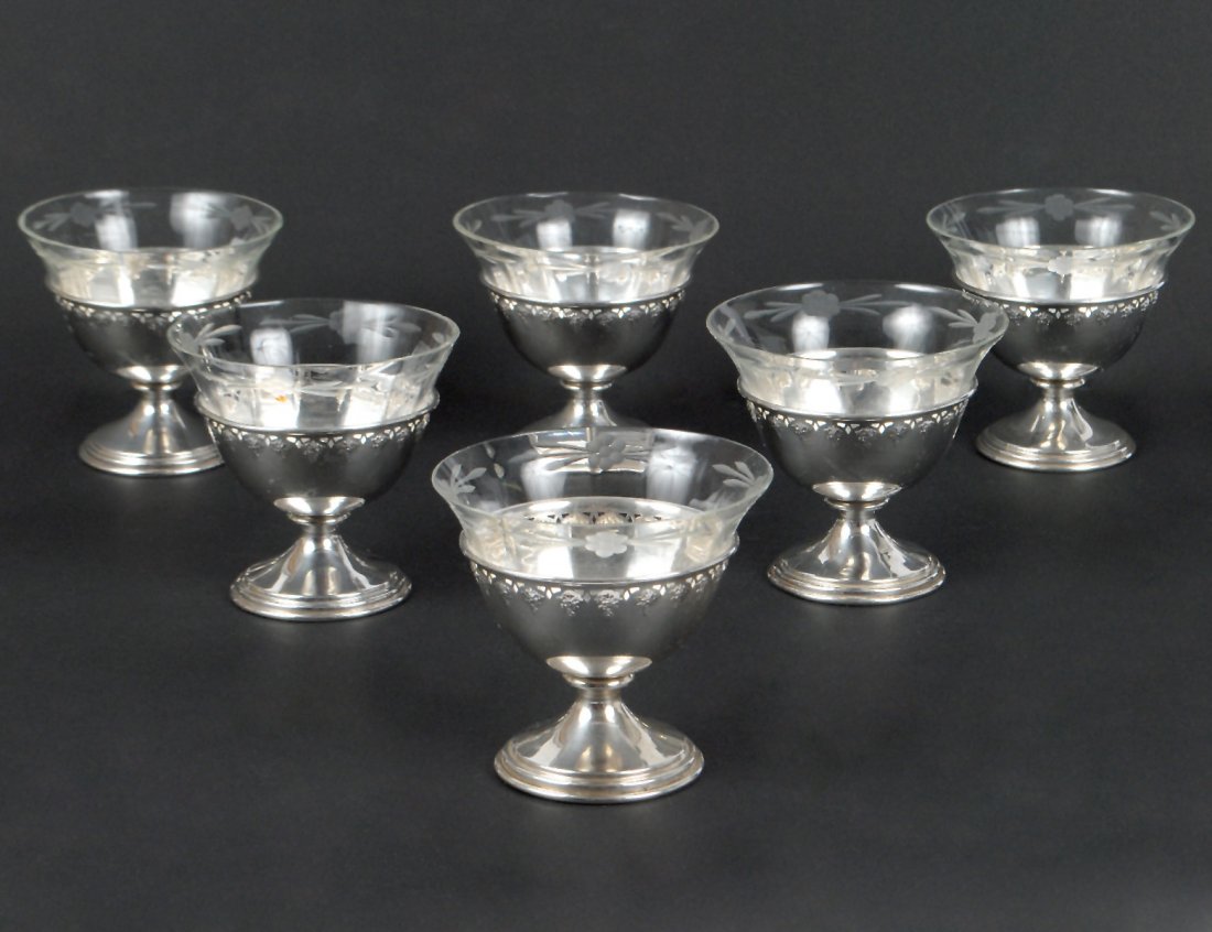 SET OF SIX PARCEL GILT STERLING SILVER AND GLASS SHERBE: American. Silver by Meriden. (12 oz) (200/300)