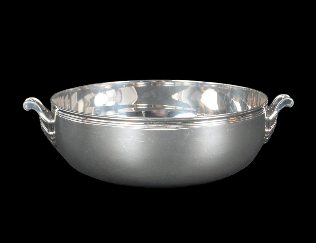 CHRISTOFLE SILVER PLATED BOWL: French. Of circular form, applied with flori-form handles. Diameter 6 3/4". (200/250)