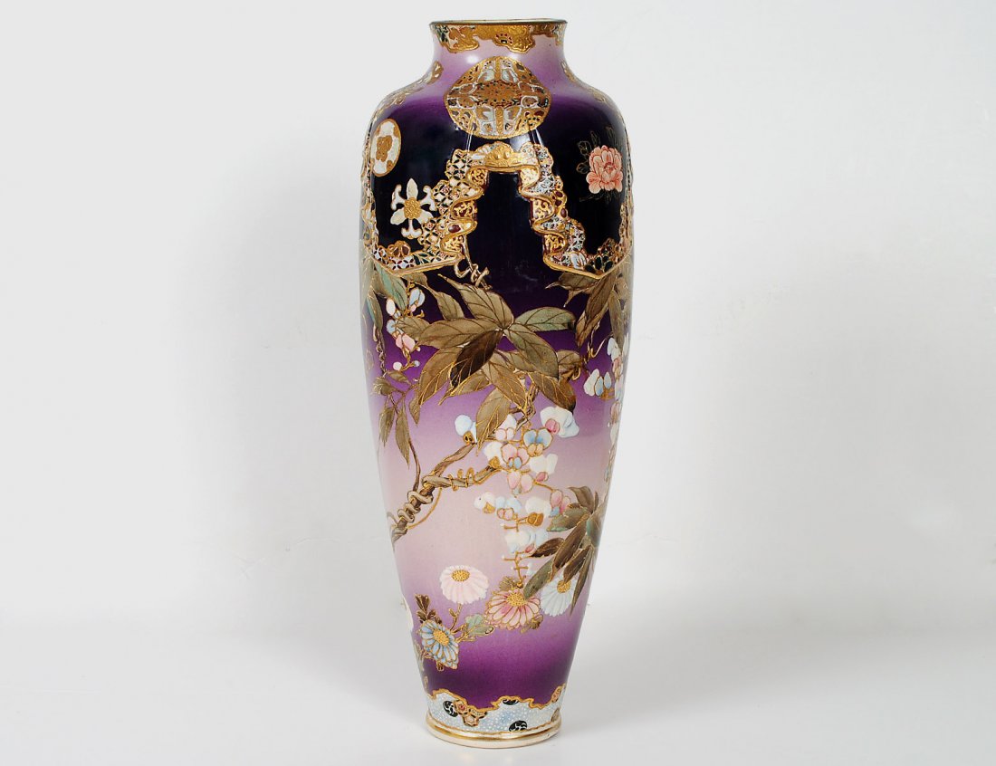 EARTHENWARE VASE: Japanese. 20th Century. Of ovoid form, decorated with kiku and foliage. Height 17 1/4". (Cond: reduced neck) (200/300)