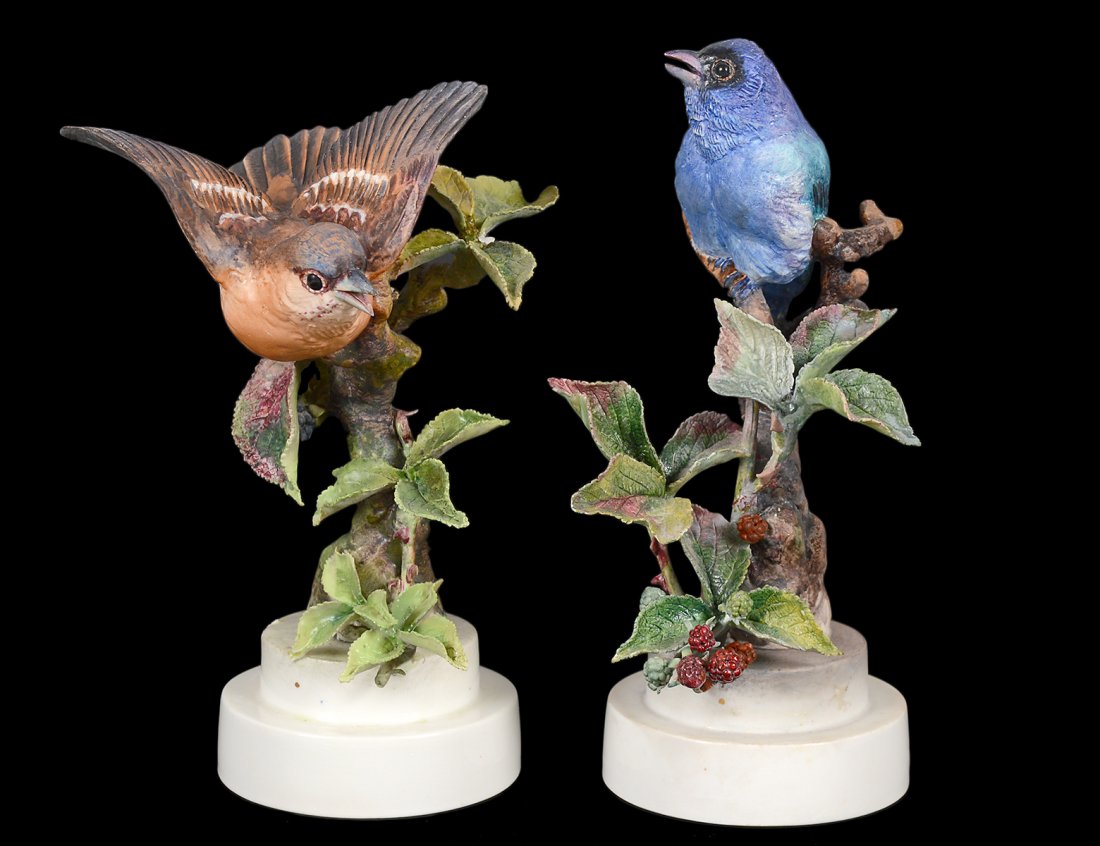 PAIR OF D. DOUGHTY PORCELAIN "INDIGO BUNTING AND: English. 1942. By Royal Worcester. Limited Edition of 500. Height 8" and 8 3/4". (Cond: one small leaf missing) (400/600)