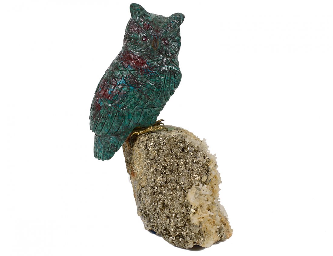 MANFRED WILD (German. Born 1944): "Owl". Unsigned. Carved Rhodanite on Quartz Base. Height 6 1/2". (300/400)