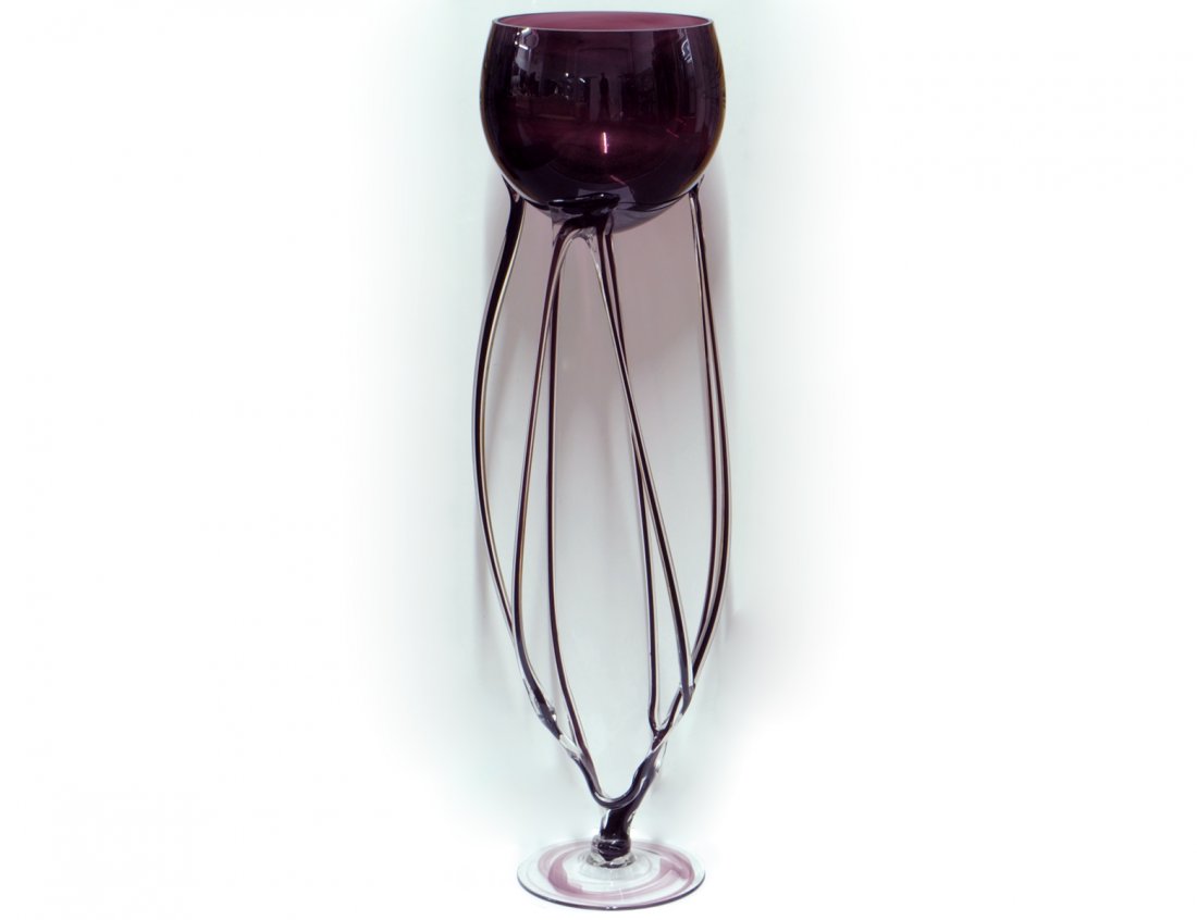 IMPRESSIVE CONTEMPORARY GLASS PEDESTAL BOWL: By Brioni. Clear and with burgundy shading. Height 36". (400/500)