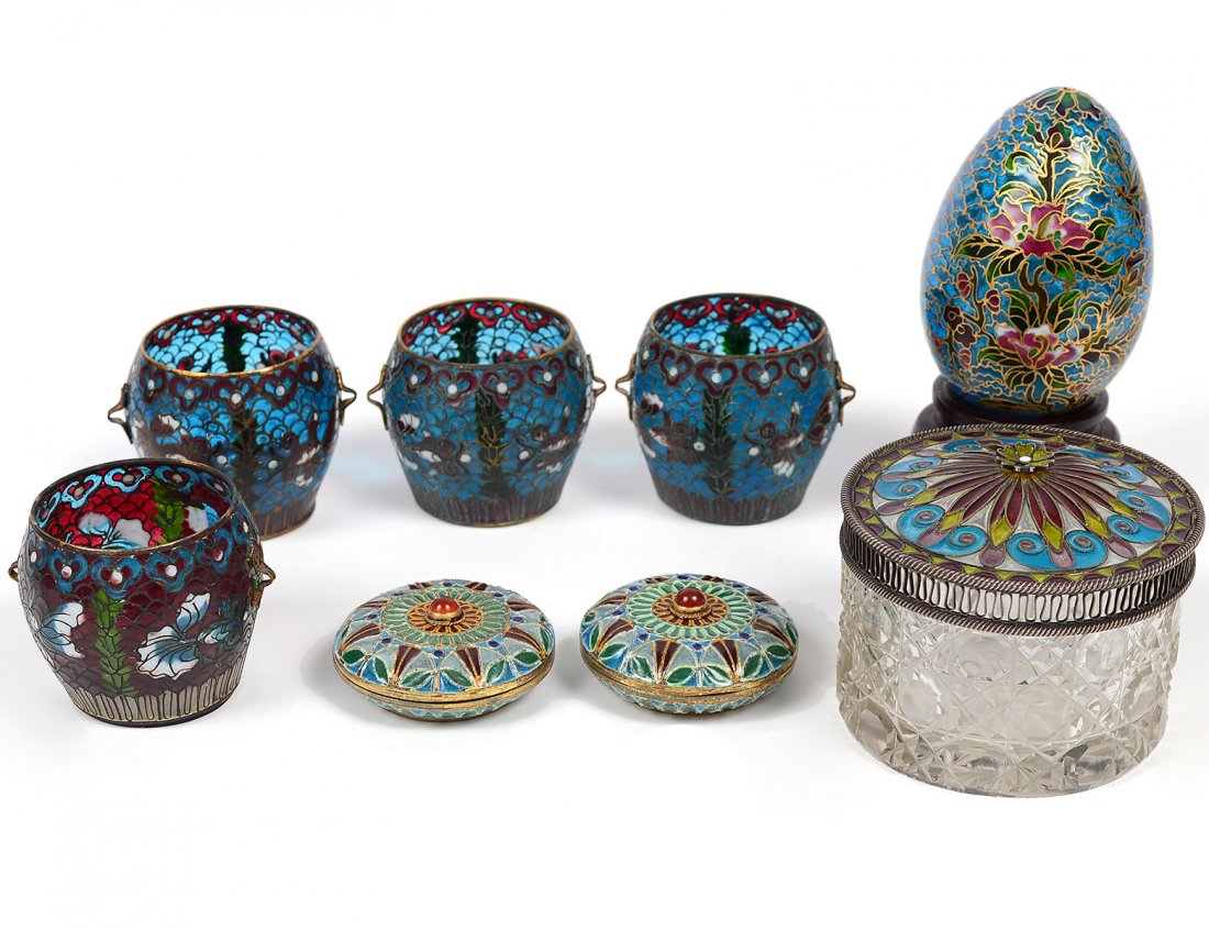 GROUP OF EIGHT PLIQUE A JOUR ENAMEL ARTICLES: Chinese. Comprising: four cups, two patch boxes, vanity jar and an egg. (150/200)