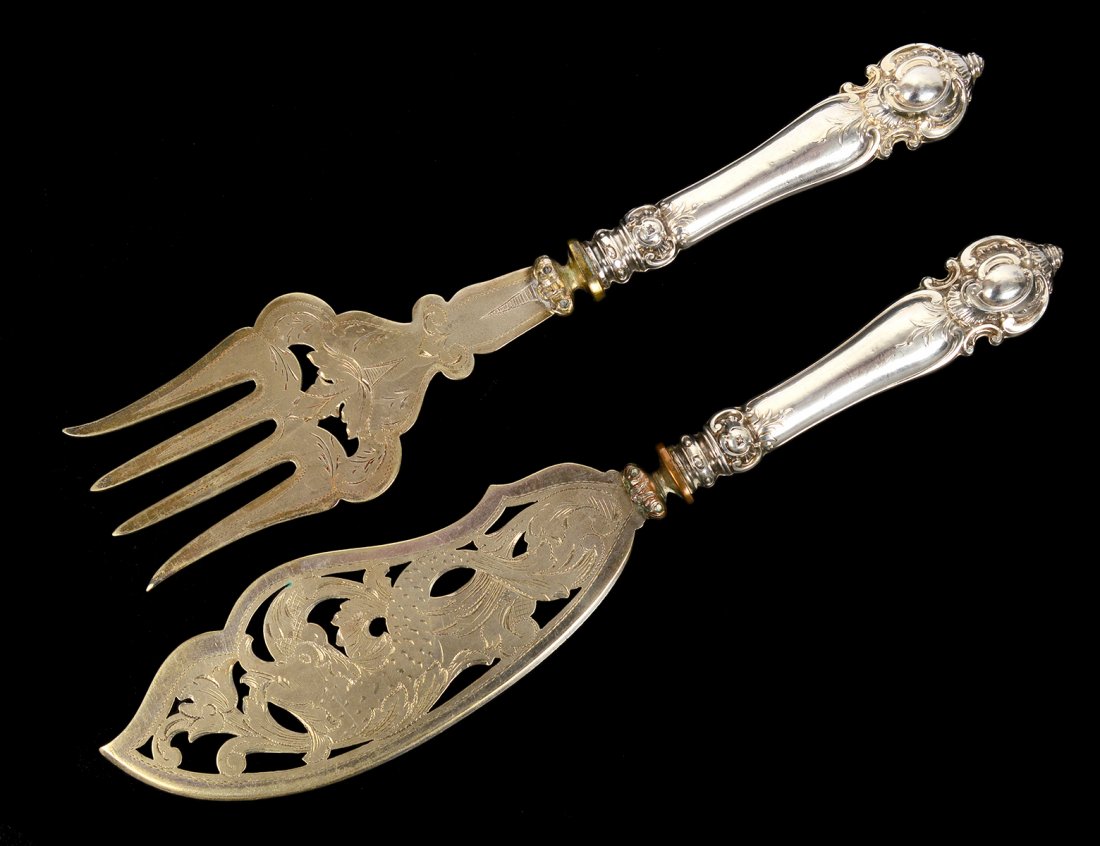 CONTINENTAL SILVER HANDLED FISH SLICE AND FORK: German. Circa 1900. (.800 Fine) Maker's mark rubbed. Length 11 1/8". (100/150)
