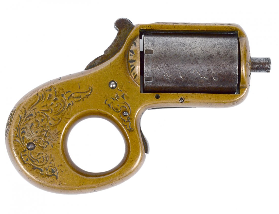 "MY FRIEND" KNUCKLE DUSTER REVOLVER: Patented in 1865. By James Reid. 22 Caliber. Serial No. 15789. Length 4". (400/600) Ex Collection Eddie Reider