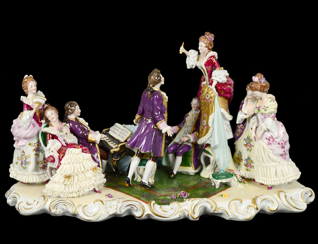 SITZENDORF PORCELAIN GROUP: German. 20th Century. Of five ladies and two men listening to a piano recital. Length 19 1/2". (700/900)