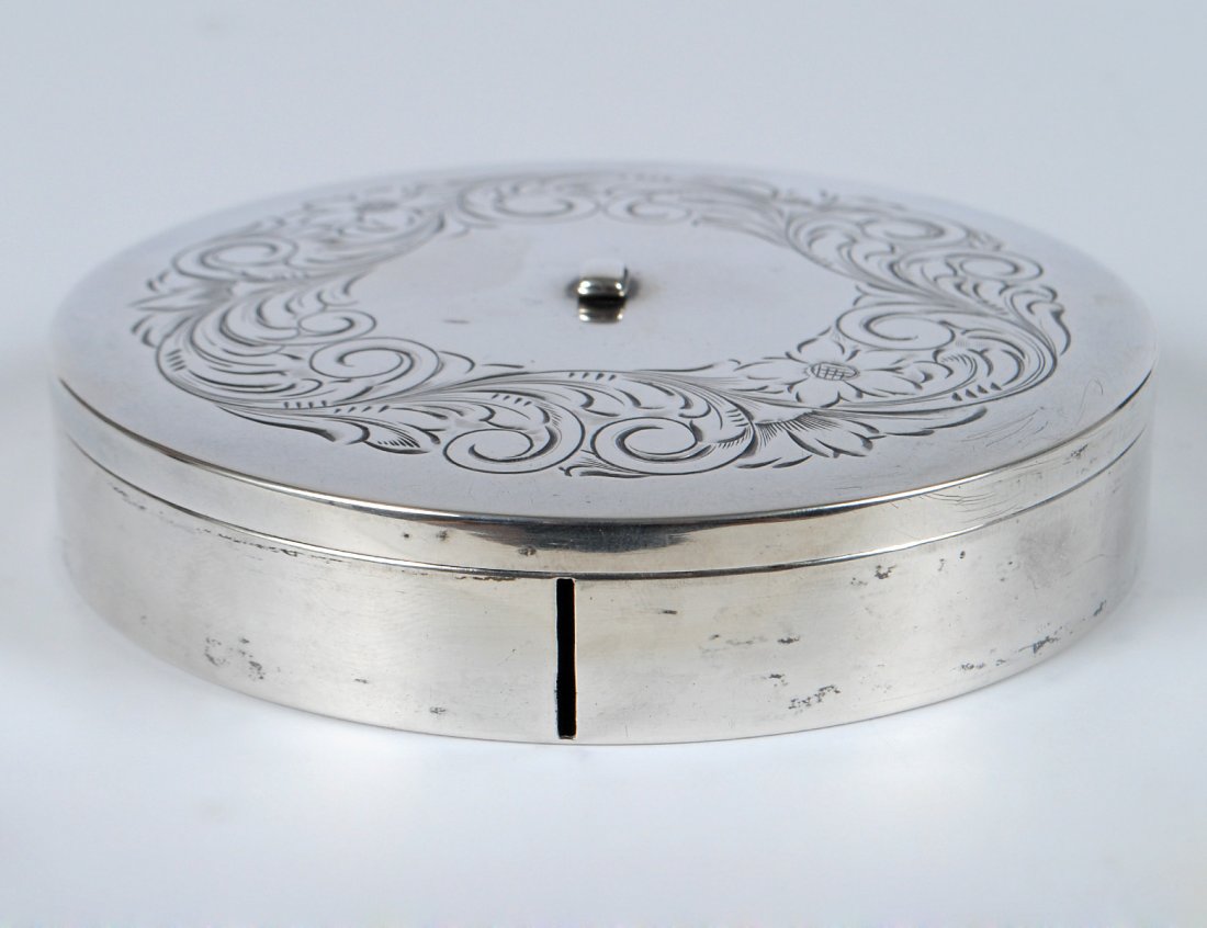STERLING SILVER BOX AND COVER: American. By Webster. Of circular shape, the cover engraved with scrolls. Diameter 3 1/2". (3 oz) (100/150)