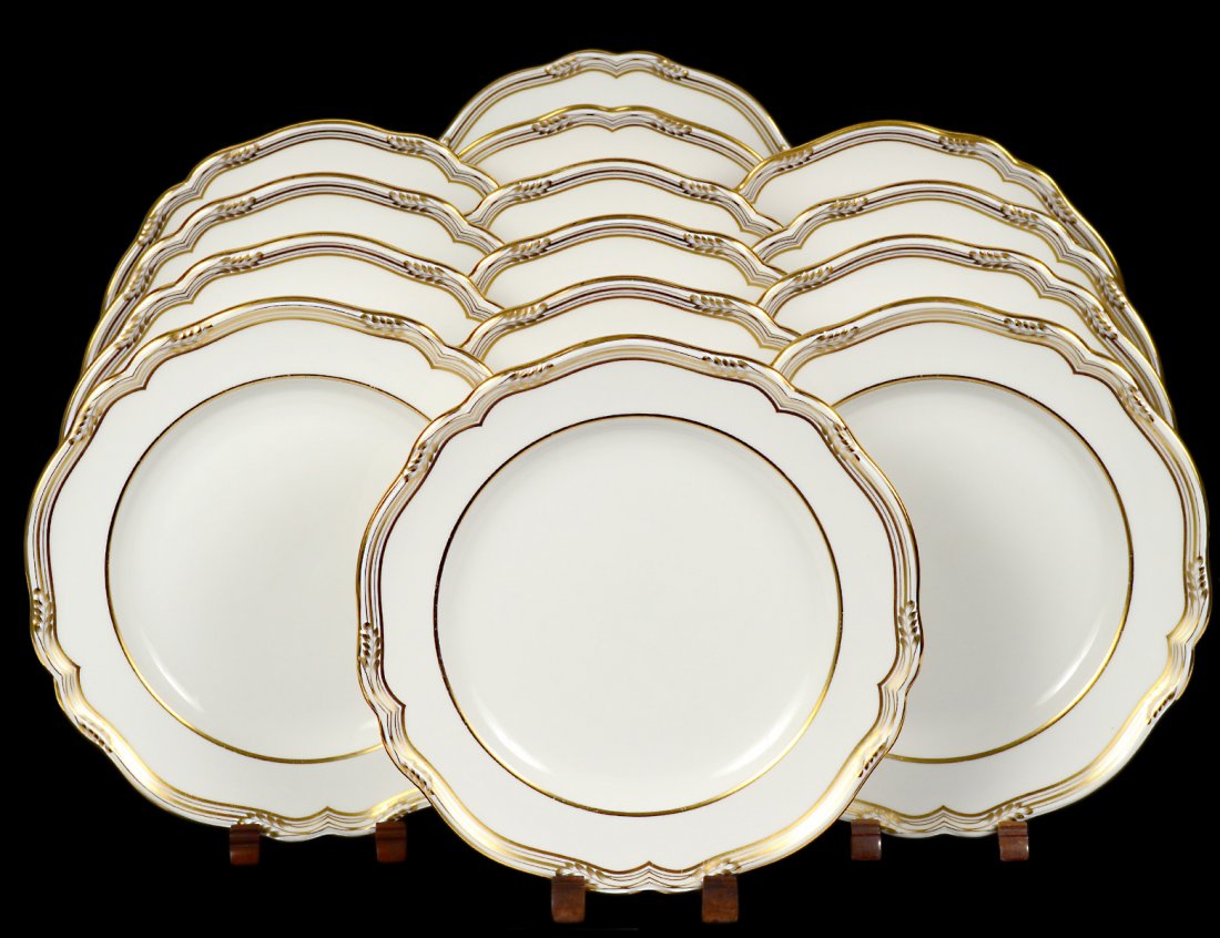 SET OF FOURTEEN SPODE PORCELAIN SERVICE PLATES: English. 20th Century. Printed factory mark and R568-H. In the “Sheffield” pattern. Diameter 11”. (600/800)