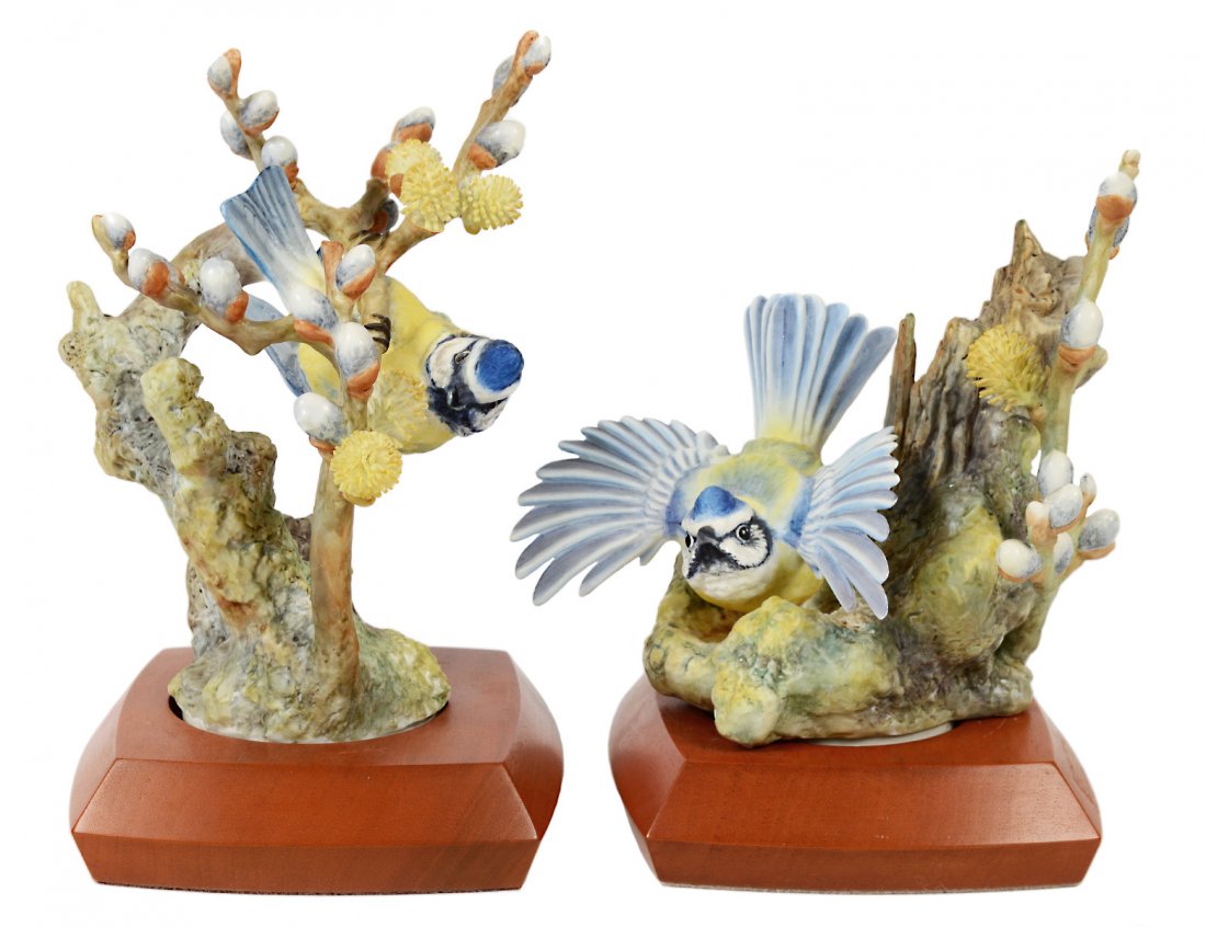 PAIR OF DOROTHY DOUGHTY PORCELAIN BLUE TIT AND PUSSY: English. Dated 1964. By Royal Worcester. Heights 8" and 7". With wood stands. (No boxes) (400/500)