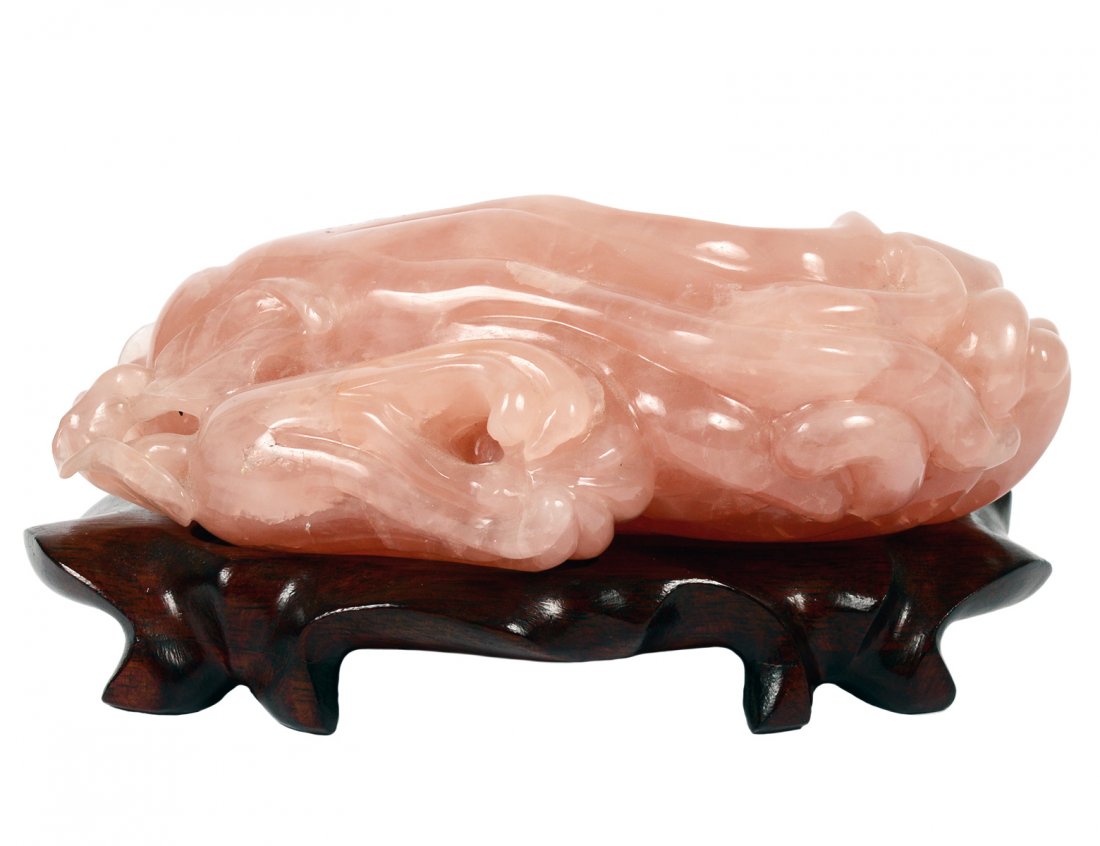 CARVED ROSE QUARTZ BRUSH WASHER: Chinese. In the shape of a citron. Length 7 1/4". With carved wood stand. (500/700)