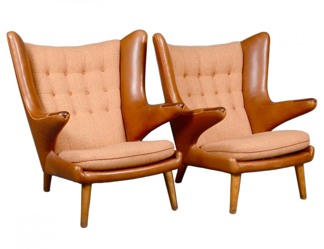 HANS WEGNER (Spanish. 1914-2007): Circa 1950. Two Papa Bears chairs. One ink stamped 16. Teak, leather and upholstery. (8000/12000)
