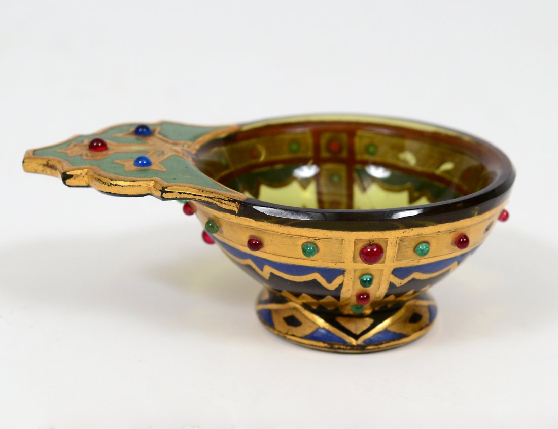 RARE RUSSIAN GLASS KOVSH: Circa 1890. Decorated with gilt and set with cabochons. Length 2 7/8". (300/400)