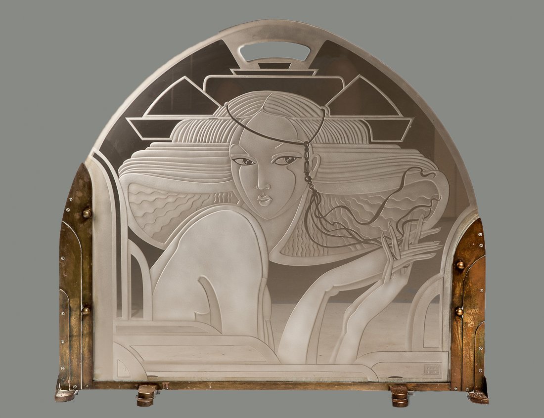 DENNIS ABBE GLASS AND BRONZE FIRE SCREEN: Signed Abbe Shefts. The art deco inspired screen etched with a female profile supported by the bronze frame. Measuring 33 7/8" by 38 1/4". (2500/3500)