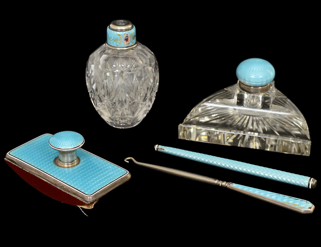 FIVE PIECE ASSEMBLED STERLING SILVER AND ENAMEL: European. 20th Century. Comprising: inkwell, blotter rocker, bottle, glove pull and pointer. (Cond: chips) (150/200)