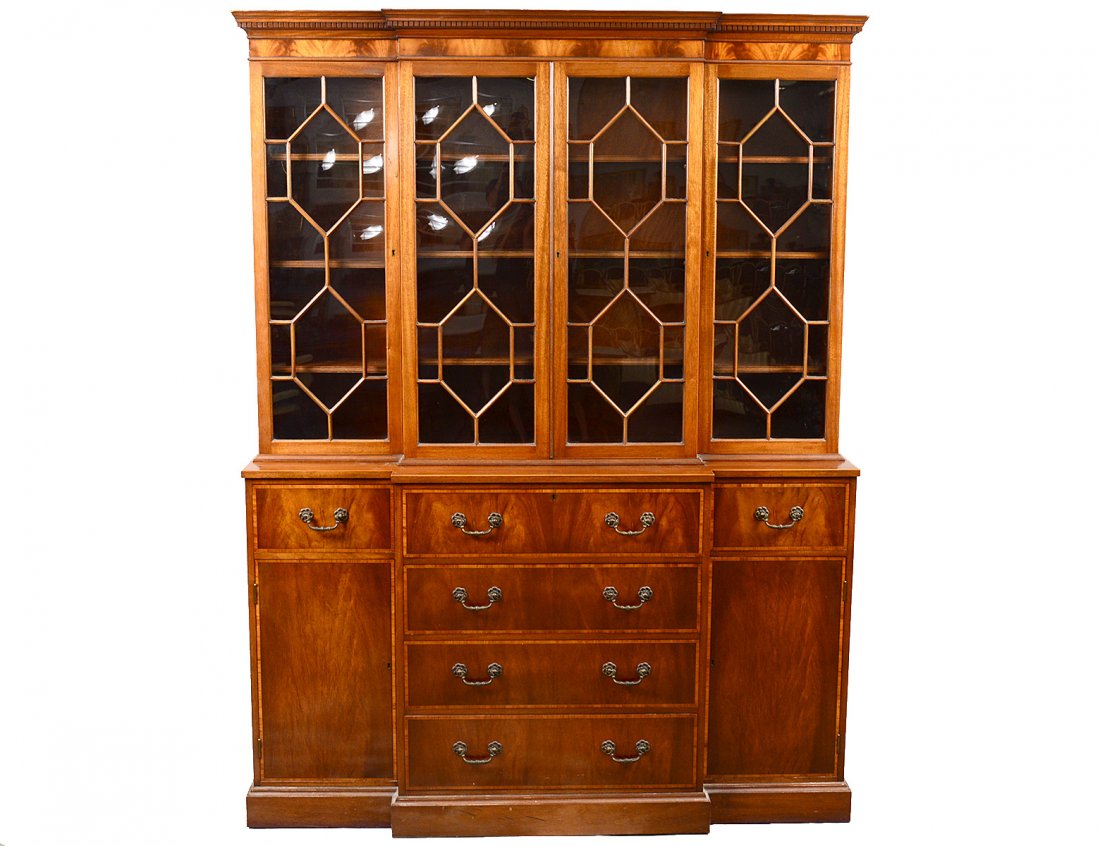 VINTAGE ENGLISH MAHOGANY BREAKFRONT: Bears tag "Tibbenham of Ipswich, England". Height 80 1/2". Width 60". Depth 17". (100/500)