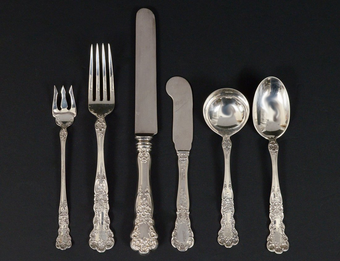 FIFTY-FOUR PIECE STERLING SILVER PART FLATWARE SET: American. Maker: Gorham. In the â€œButtercupâ€ pattern. Comprising: twelve luncheon knives, thirteen luncheon forks, six seafood cocktail forks, five bullion spoons, eight tea spoons, and ten b