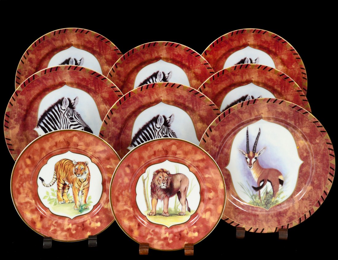GROUP OF NINE PORCELAIN ANIMAL PLATES: Lynn Chase Design. Of African animals. Comprising: seven dessert and two bread and butter plates. (100/150)