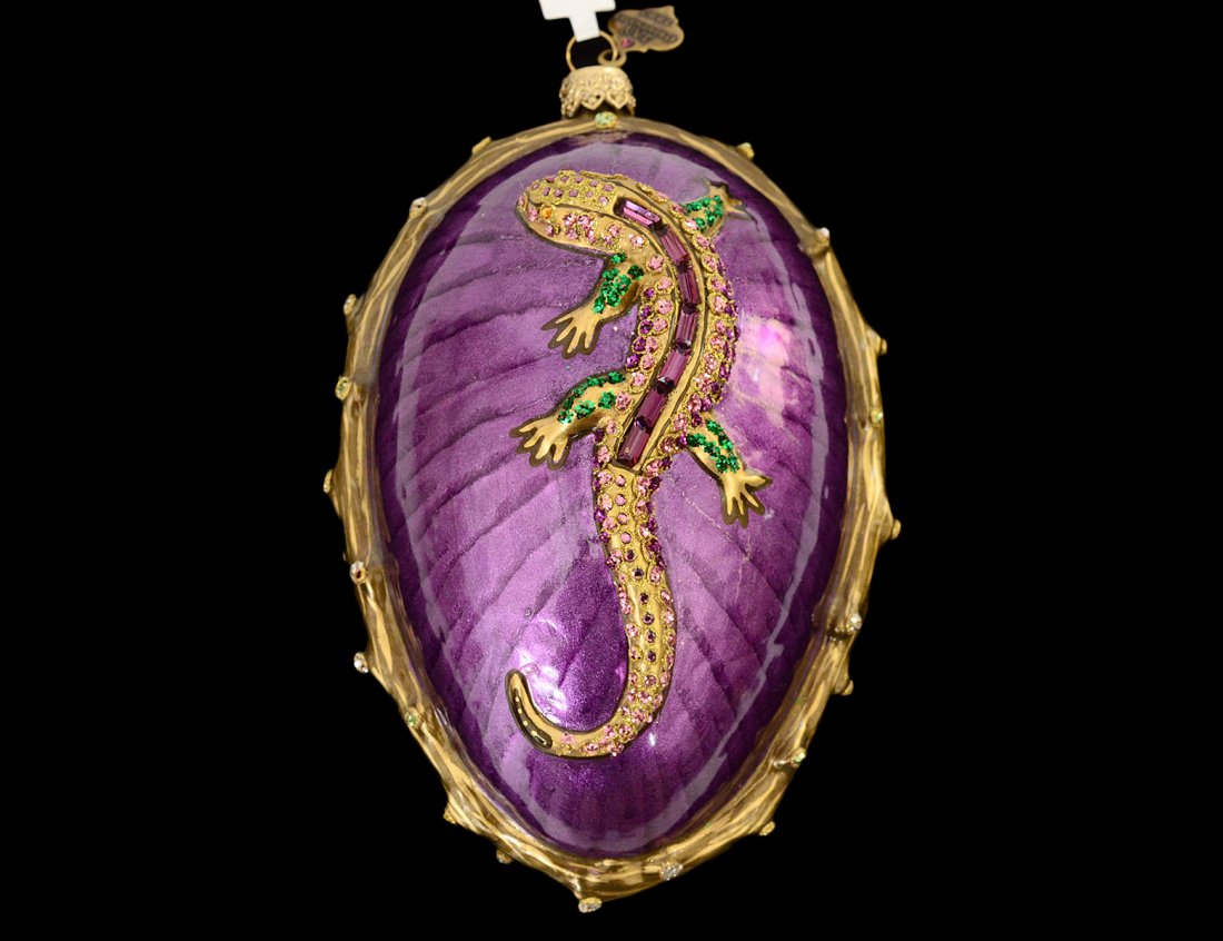 LARGE GLASS CHRISTMAS ORNAMENT: In the form of an egg with gilt lizards on either side. Height 5 Â¾â€. (40/60)