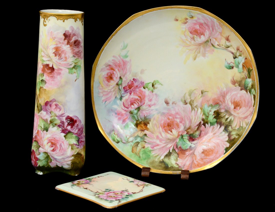 GROUP OF THREE LIMOGES STYLE PORC TABLE ARTICLES: French. 20th Century. Comprising: vase, height 11 3/4"; charger, diameter 12 1/2"; and a trivet, diameter 5 5/8". (125/175)