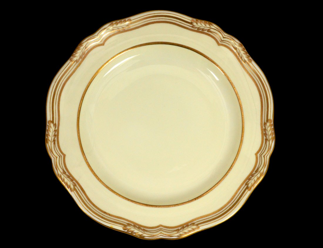 SET OF TEN SPODE PORC BREAD & BUTTER PLATES: English. Circa 1920. Each with gilt floral border. Diameter 6 1/8". (80/120)