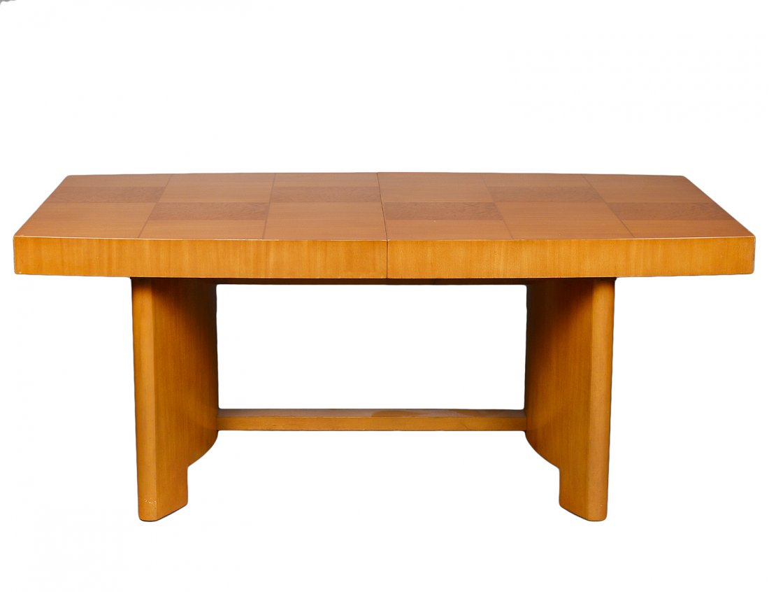 HERMAN MILLER GILBERT RHODE DINING TABLE: Mid-Century. No. 3725. The top with burl checker board design, raised on trestle supports. Height 29 1/2". Width 72". Depth 40". With two extension leaves, each measuring 24". (1000/1500)