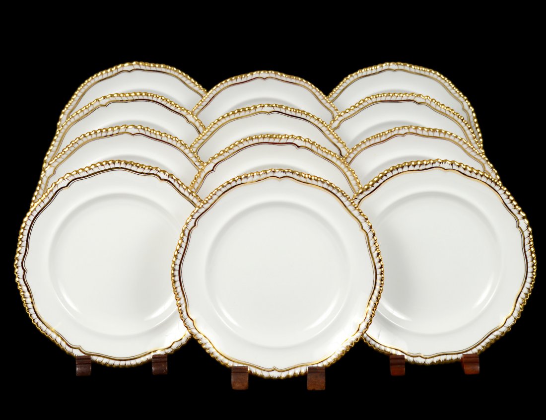 SET OF TWELVE SPODE PORCELAIN CAKE PLATES: English. 20th Century. Printed factory mark and gilt 4223Z. Diameter 8â€. (200/300)