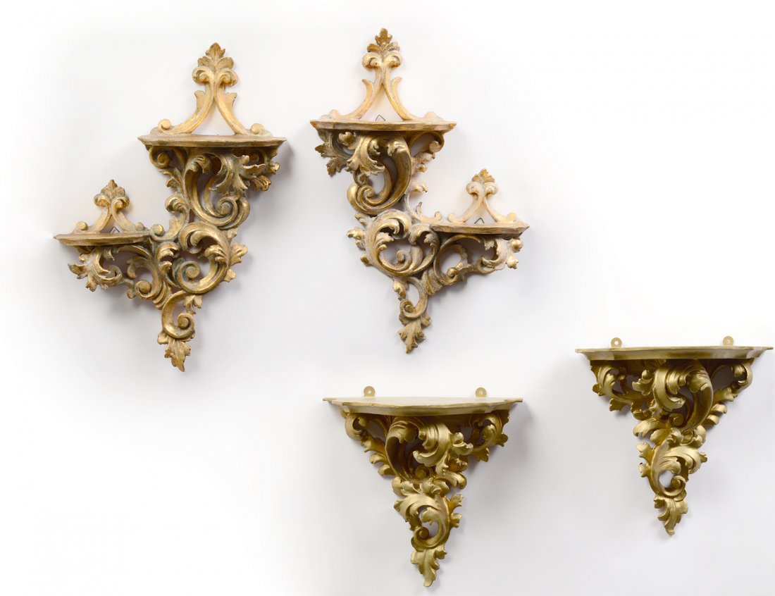 TWO PAIRS OF CARVED AND GILTWOOD WALL BRACKETS: Italian. The first with double shelves. Height 17". The second, height 10". (200/300)