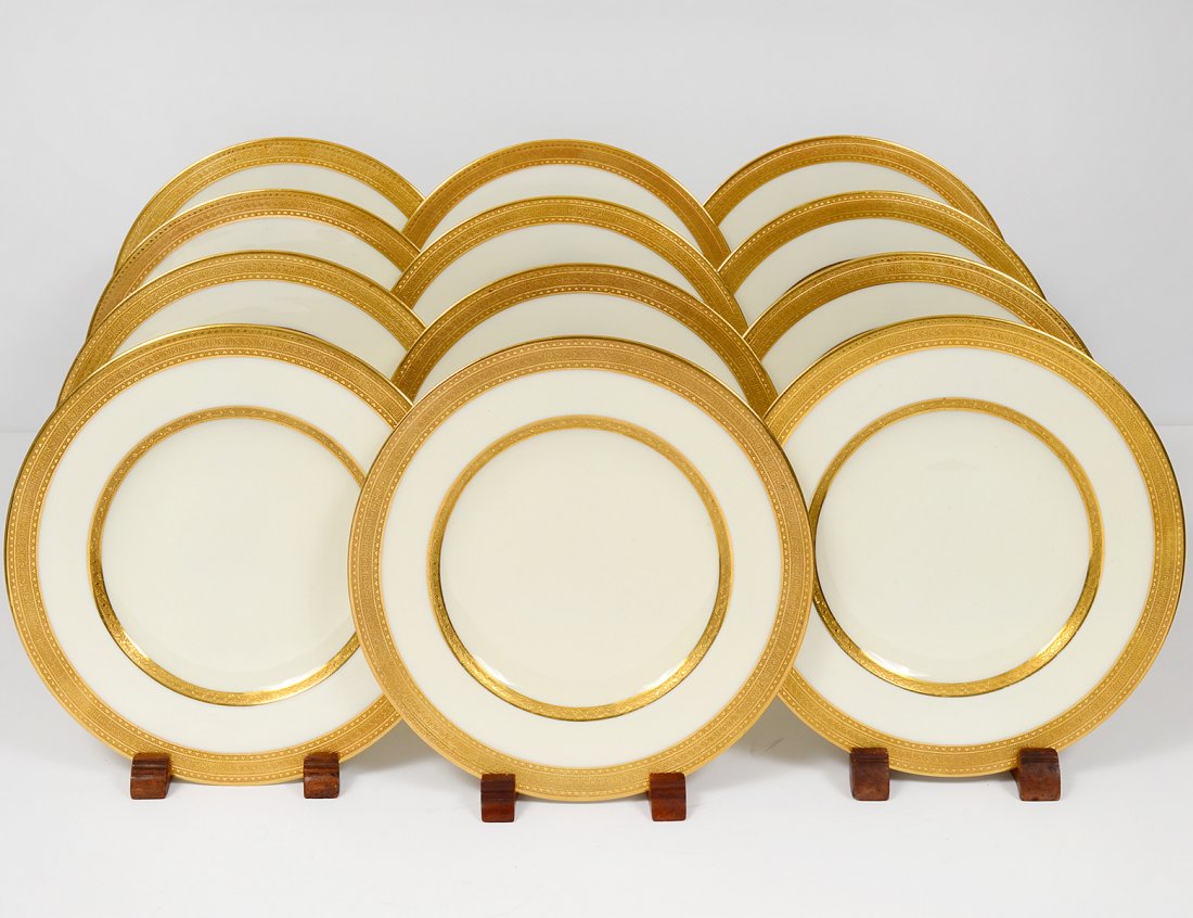 SET OF TWELVE ROYAL WORCESTER PORCELAIN CAKE PLATES: English. Date mark for 1917. With gilt borders. Diameter 7 7/8". (150/200) Retailed by Ovington Bros., N.Y.