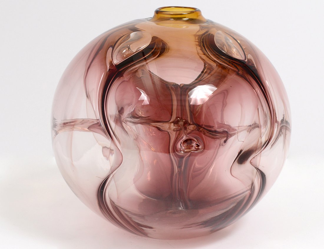 PAUL MANNERS HAND BLOWN STUDIO GLASS VASE: Signed and numbered 80046. The globular vessel in amber and brown colors. Height 6 Â¼â€. (300/400)