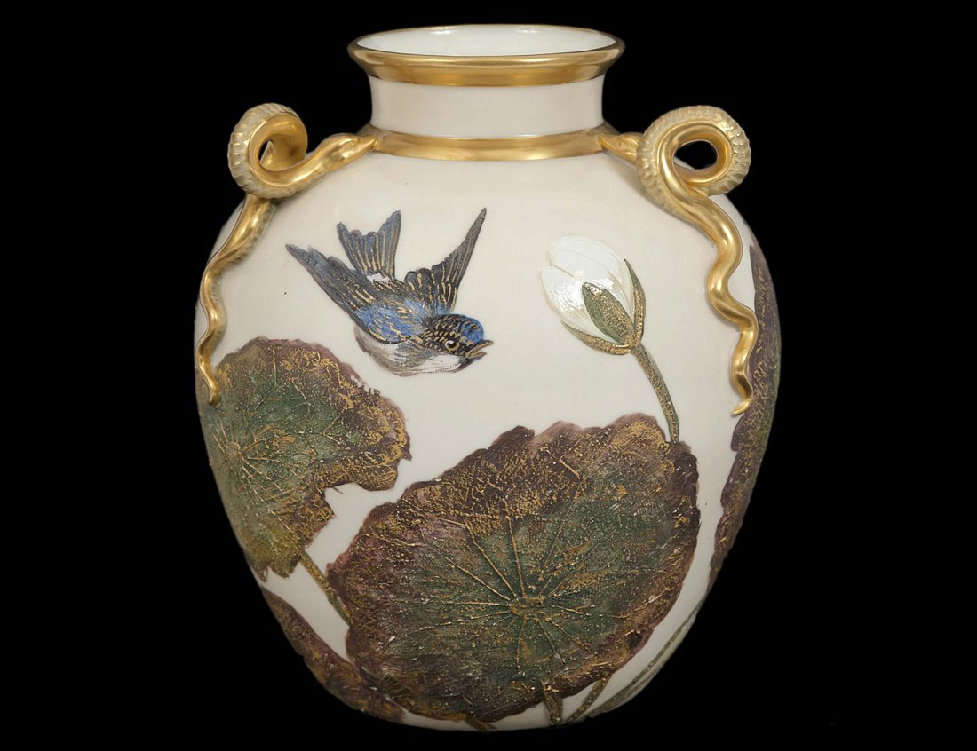 ROYAL WORCESTER PORCELAIN VASE: English. Date mark for 1881. Shape No. 655. Molded with three serpent handles. Height 7 3/4". (600/800)