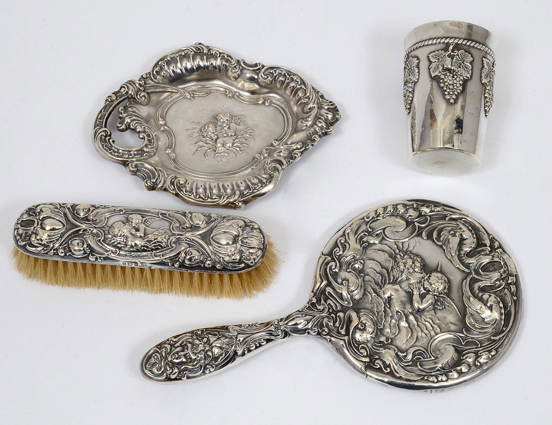 GROUP OF FOUR STERLING SILVER ARTICLES: Comprising: American wine cup, height 3 1/4"; chased dish, length 6 1/4"; hand mirror, length 9 1/4"; and an English, Birmingham brush, length 6". (400/500)