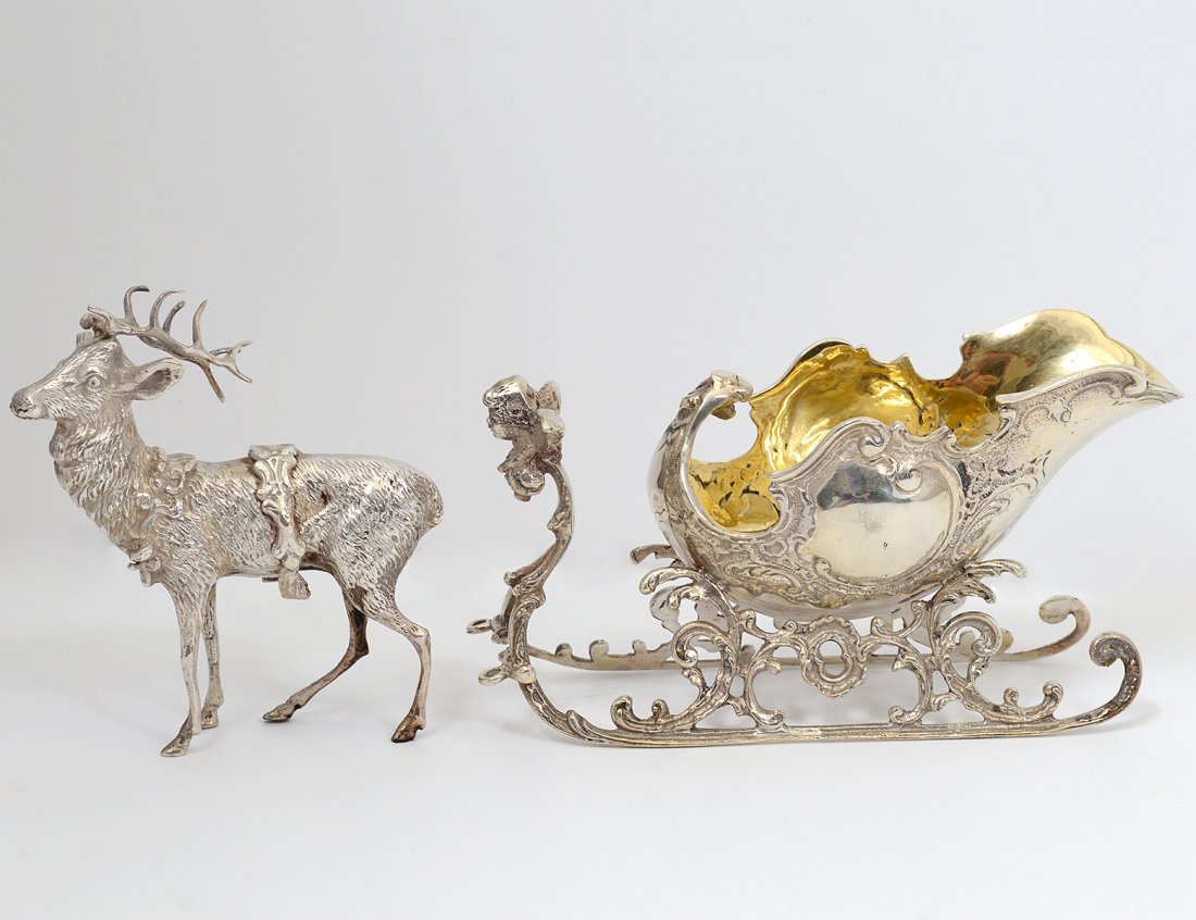 SILVER SALT CELLAR: European. Circa 1900. In the form of a sleigh pulled by a reindeer. Length 9". (11 oz) (Cond: reins missing) (300/400)