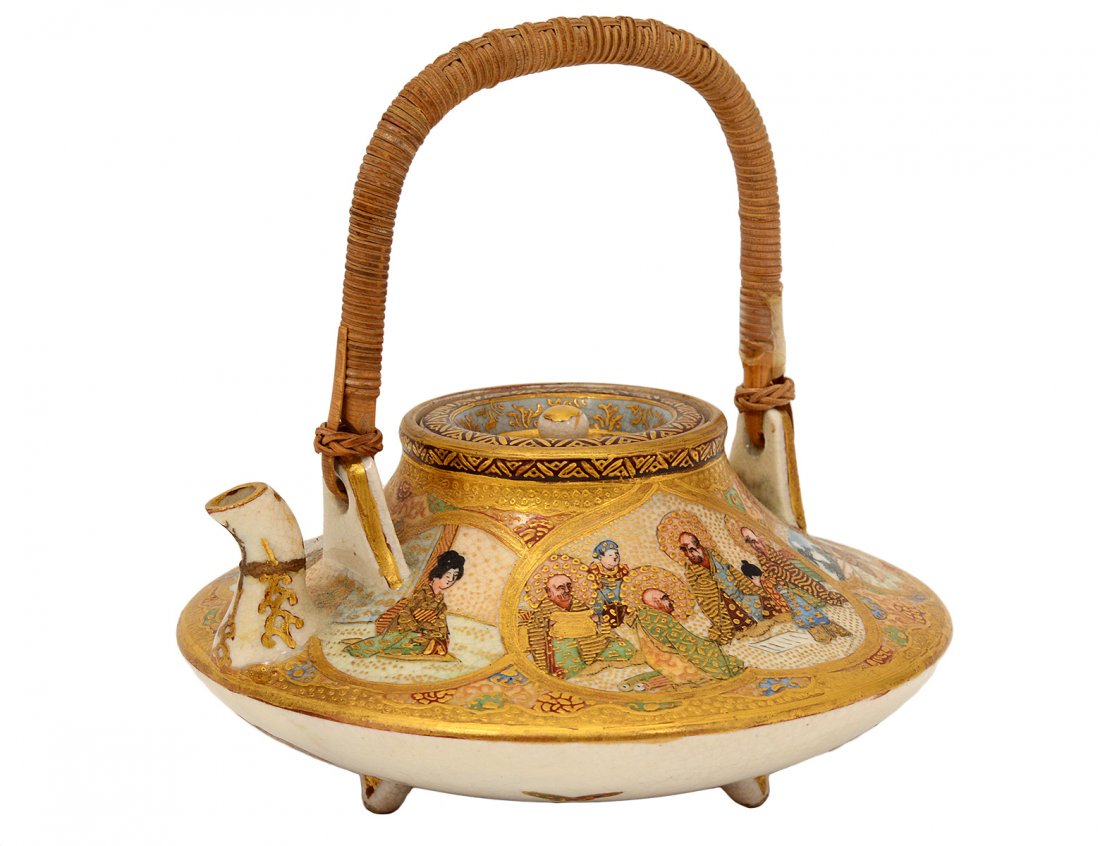 MINIATURE SATSUMA POTTERY TEA POT: Japanese. Signed. Of compressed circular shape. Diameter 4 3/8". (Cond: spout restored) (150/200)