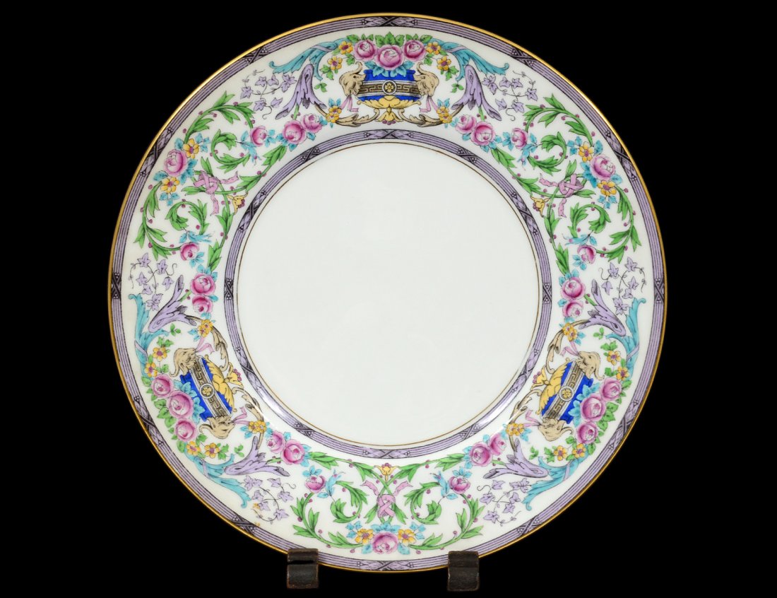 SET OF TWELVE MINTONS PORCELAIN SERVICE PLATES: English. Date mark for 1931. Printed and impressed factory marks. Diameter 10 1/4". (500/800) Retailed by Gilman Collamore, N.Y.