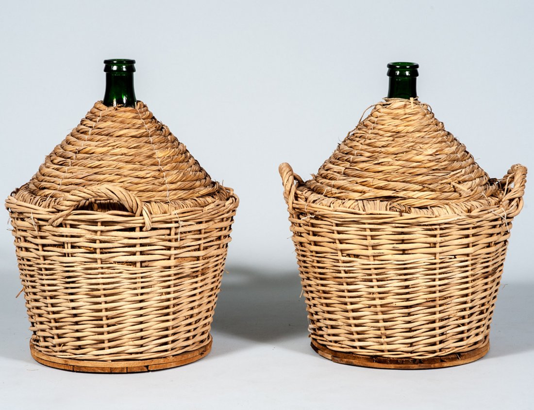 GROUP OF FIVE STRAW ENCASED LARGE WINE BOTTLES: Italian. Height 26 1/4". (500/700)