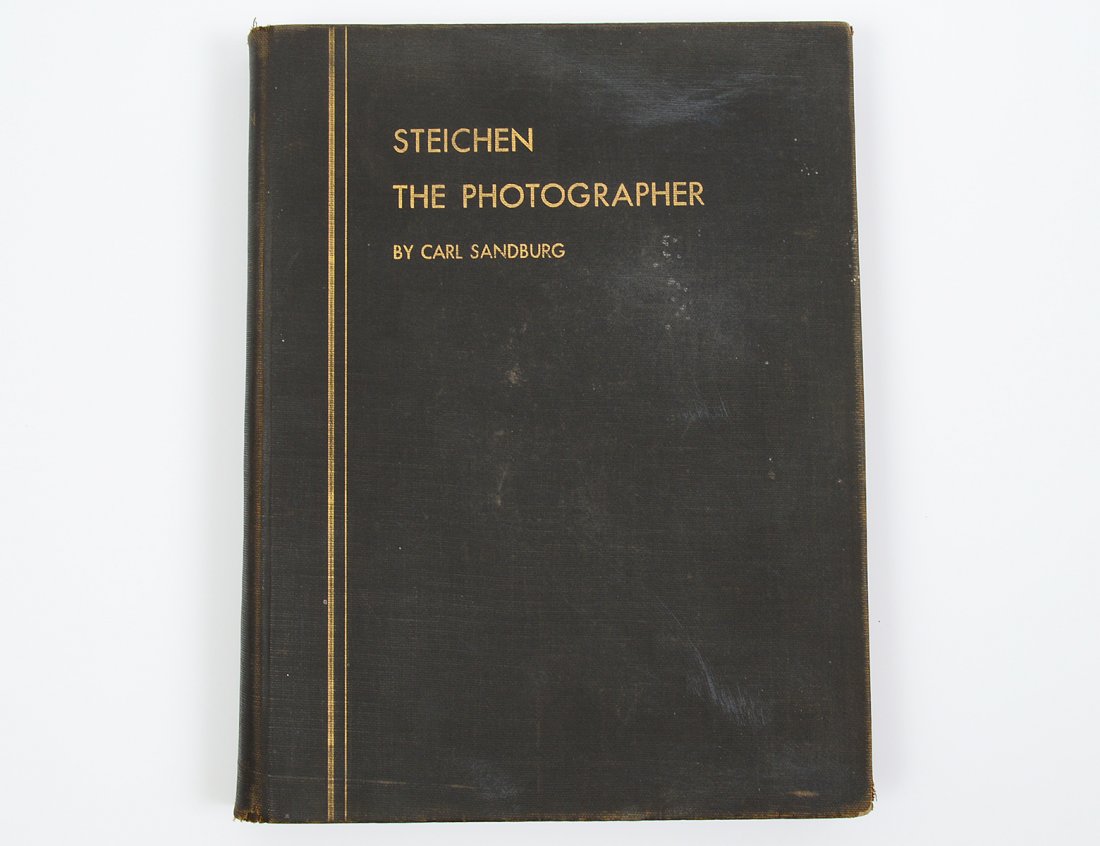 EDWARD STEICHEN (American. 1879-1973) AND CARL SANDBURG: (Photography Book), titled "The Photographer". Signed by both Steichen and Sandburg in Ink on the front end paper. Published 1929 by Harcourt Brace & Co. N.Y. Black cloth covers with gilt lettering. (