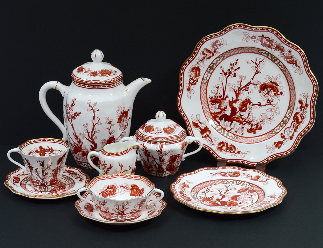 172 PIECE COALPORT PORCELAIN PART DINNER SERVICE: English. In the "Indian Tree Coral" pattern. Comprising: twenty-four dinner plates, twenty-four salad plates, twenty-four bread and butter plates, twenty-four cream soups and stands, twenty-four cups 
