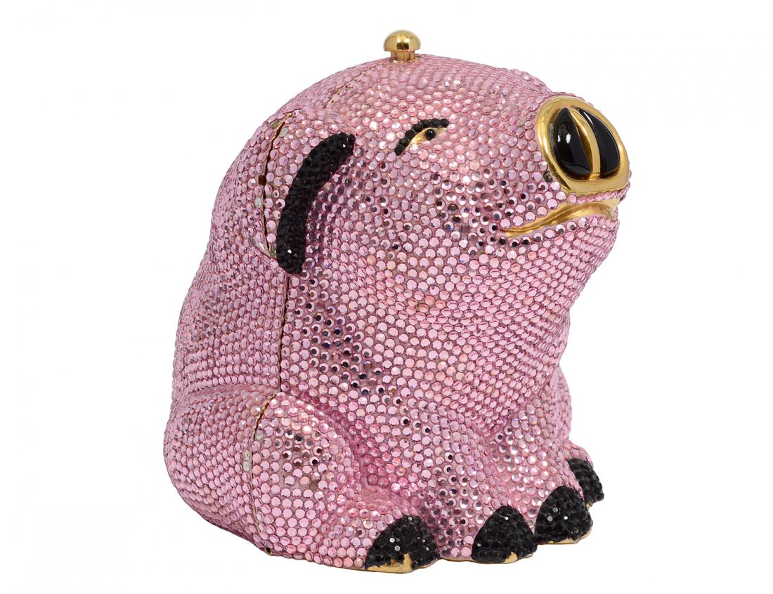 JUDITH LIEBER GILT METAL/CRYSTAL "PIG MINAUDIERE": EVENING BAG Signed. With clear and colored crystals, change purse, mirror and comb. Height 4". With shoulder chain. (Cond: a few stones missing on toes) (1000/1500)
